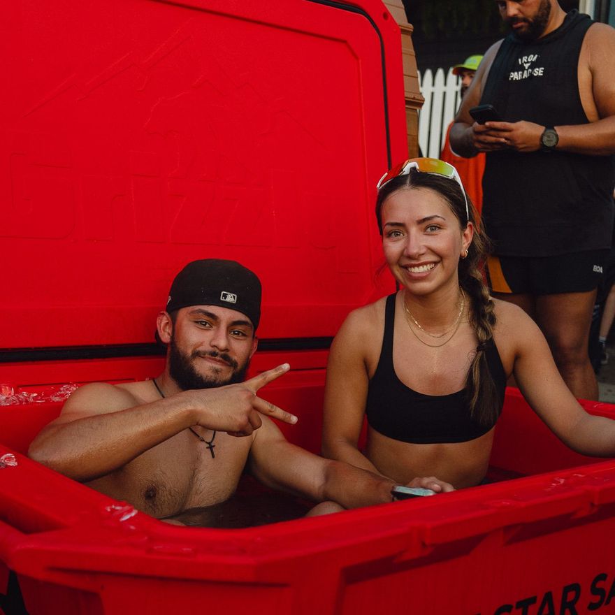Two guests in a Lone Star Sauna cold plunge