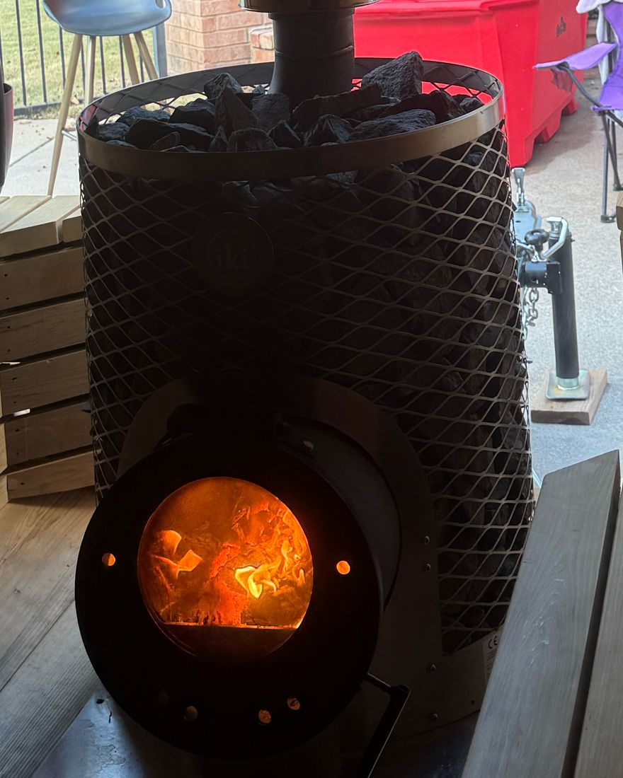 Fire burning inside the Iki wood stove